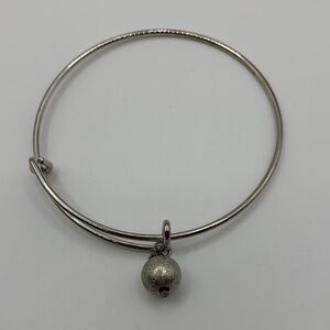 Silver-tone Bangle Bracelet with Spherical Metallic Charm